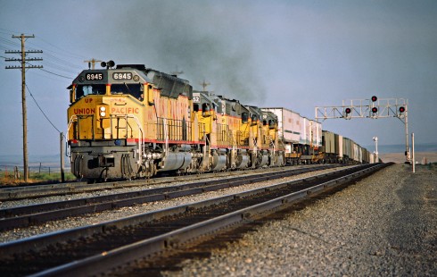 Westbound Union Pacific Railroad freight train at Reverse, Idaho, on June 29, 1984. Photograph by John F. Bjorklund, © 2016, Center for Railroad Photography and Art. Bjorklund-90-13-12