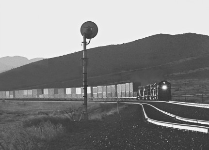 Westbound Southern Pacific Railroad stack train (American President Lines) at Strobel siding near Alpine, Texas, in February 1986. Photograph by J. Parker Lamb, © 2017, Center for Railroad Photography and Art. Lamb-02-084-06