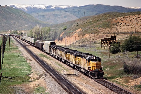 Eastbound Union Pacific Railroad freight train near Henefer, Utah, on May 13, 1986. Photograph by John F. Bjorklund, © 2016, Center for Railroad Photography and Art. Bjorklund-90-21-23