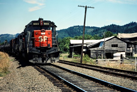 Westbound Southern Pacific Railroad freight train in Yoncalla, Oregon, on July 19, 1982. Photograph by John F. Bjorklund, © 2016, Center for Railroad Photography and Art. Bjorklund-85-20-18