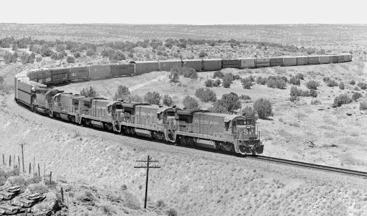 Southbound Southern Pacific Railroad auto train climbs curved route on south side of Arroyo Pintada (south of Santa Rosa, New Mexico) in April 1988. Photograph by J. Parker Lamb, © 2017, Center for Railroad Photography and Art. Lamb-02-091-07