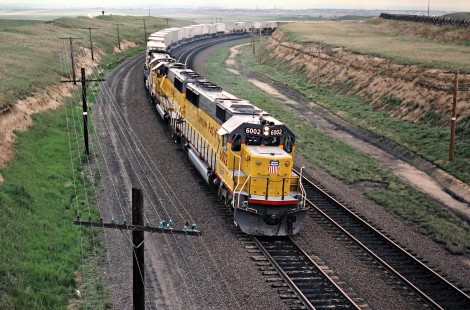 Eastbound Union Pacific Railroad freight train in Archer, Wyoming, on May 23, 1987. Photograph by John F. Bjorklund, © 2016, Center for Railroad Photography and Art. Bjorklund-91-01-21