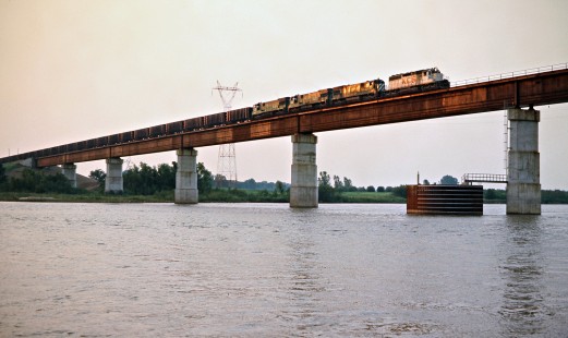 Southbound Kansas City Southern Railway coal train crossing the Arkansas River in Spiro, Oklahoma, on July 18, 1977. Photograph by John F. Bjorklund, © 2016, Center for Railroad Photography and Art. Bjorklund-61-15-16