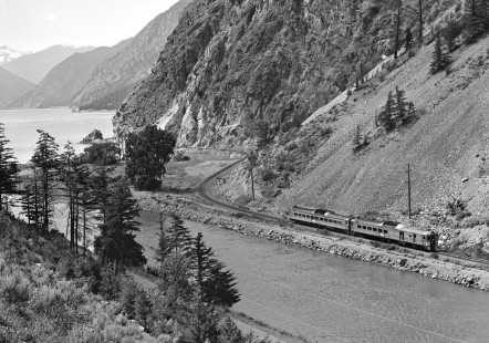 British Columbia Railway passenger train no. 1 approaches its destination of Lillooet, British Columbia, in June 1978. Seton Lake in background. Photograph by J. Parker Lamb, © 2017, Center for Railroad Photography and Art. Lamb-02-111-01