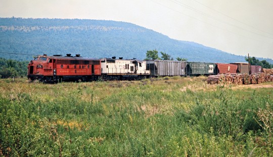 Westbound Kansas City Southern Railway freight train near Heavener, Oklahoma, on July 19, 1977. Photograph by John F. Bjorklund, © 2016, Center for Railroad Photography and Art. Bjorklund-61-19-16