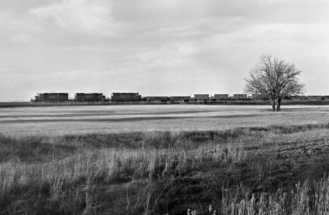 Near sunset a Missouri–Kansas–Texas Railroad crushed rock train approaches main line at Granger, Texas, in December 1975. Photograph by J. Parker Lamb, © 2016, Center for Railroad Photography and Art. Lamb-02-046-03