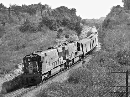 Northbound Atchison, Topeka and Santa Fe Railway <i>Texas Chief</i> passenger train zips through cut near Valley Mills, Texas, in May 1967. Photograph by J. Parker Lamb, © 2016, Center for Railroad Photography and Art. Lamb-02-069-10