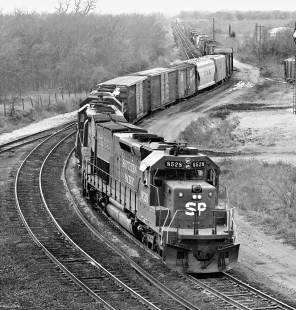 Northbound Southern Pacific Railroad manifest enters yard at Hearne, Texas, from San Antonio via Dalsa Cutoff line in October 1975. Photograph by J. Parker Lamb, © 2016, Center for Railroad Photography and Art. Lamb-02-054-05