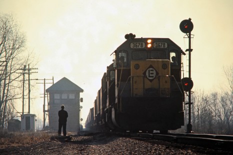 Westbound Erie Lackawanna Railway freight train crossing the Pennsylvania Railroad in Newton, Indiana, on March 28, 1976. Photograph by John F. Bjorklund, © 2016, Center for Railroad Photography and Art. Bjorklund-56-01-16