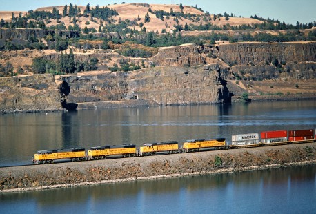Westbound Union Pacific Railroad freight train along the Columbia River at Rowena, Oregon, on September 14, 1991. Photograph by John F. Bjorklund, © 2016, Center for Railroad Photography and Art. Bjorklund-91-29-21