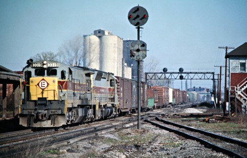 Eastbound Conrail freight train with Erie-Lackawanna Railway power in Mansfield, Ohio, on April 3, 1976. Photograph by John F. Bjorklund, © 2016, Center for Railroad Photography and Art. Bjorklund-80-04-19