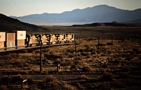 Westbound Union Pacific Railroad freight train at Black Rock, Utah, on April 8, 1989. Photograph by John F. Bjorklund, © 2016, Center for Railroad Photography and Art. Bjorklund-91-23-13
