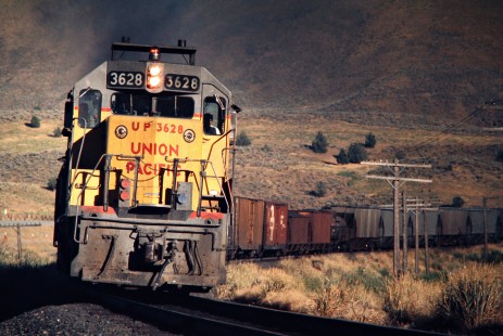 Westbound Union Pacific Railroad freight train in Durkee, Oregon, on July 16, 1974. Photograph by John F. Bjorklund, © 2016, Center for Railroad Photography and Art. Bjorklund-89-09-14