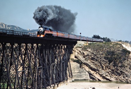 Westbound Southern Pacific Railroad passenger train, <i>Daylight</i>, led by steam locomotive no. 4449 in Gaviota, California, on June 19, 1984. Photograph by John F. Bjorklund, © 2016, Center for Railroad Photography and Art. Bjorklund-86-14-03