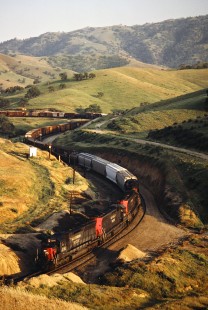 Westbound Southern Pacific Railroad freight train in Allard, California, on April 13, 1989. Photograph by John F. Bjorklund, © 2016, Center for Railroad Photography and Art. Bjorklund-87-22-06