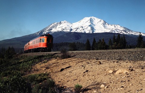 Eastbound Southern Pacific Railroad passenger train, <i>Daylight</i>, led by locomotive no. 4449 passing Mt. Shasta near Azalea, California, on June 23, 1984. Photograph by John F. Bjorklund, © 2016, Center for Railroad Photography and Art. Bjorklund-86-23-17