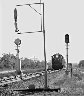 Northbound Missouri Pacific Railroad <i>Texas Eagle</i> passenger train races toward McNeil station for mail pick up in June 1968. Photograph by J. Parker Lamb, © 2016, Center for Railroad Photography and Art. Lamb-02-063-05