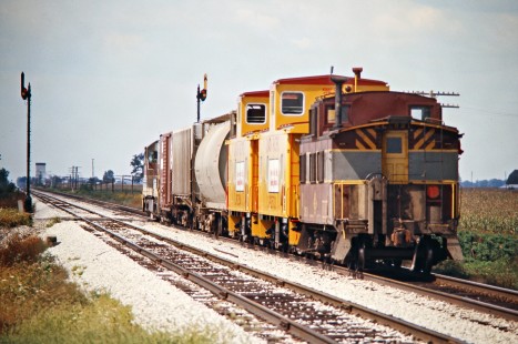 Westbound Erie Lackawanna Railway freight train with two new Union Pacific cabooses in Spencerville, Ohio, on September 13, 1975. Photograph by John F. Bjorklund, © 2016, Center for Railroad Photography and Art. Bjorklund-55-10-18