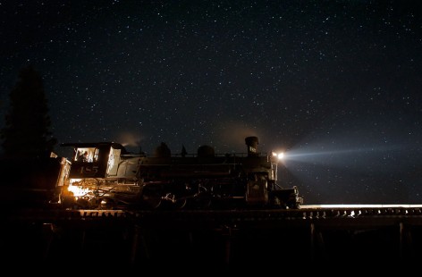 Former Denver & Rio Grande Western 2-8-2 steam locomotive no. 485 pauses on a trestle near Cumbres, Colorado, on the Cumbres & Toltec Scenic Railroad on the starry night of September 21, 2011. The photographer blended two exposures, one of the locomotive and one of the sky, to balance the lighting. He also used the Content Aware command in Photoshop, along with manual touch-up, to expand the composition at left and bottom. Finally, he used Neat Image to remove noise from the image and applied a modest amount of sharpening.