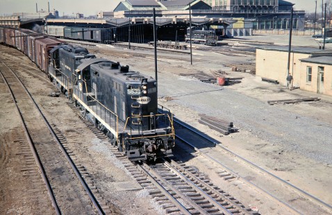 Penn Central freight train passing Michigan Central Station at Detroit, Michigan, in March 1968. Photograph by John F. Bjorklund, © 2016, Center for Railroad Photography and Art. Bjorklund-79-01-21