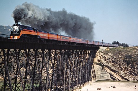 Westbound Southern Pacific Railroad passenger train, <i>Daylight</i>, led by steam locomotive no. 4449 in Gaviota, California, on June 19, 1984. Photograph by John F. Bjorklund, © 2016, Center for Railroad Photography and Art. Bjorklund-86-14-02