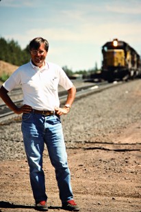 John F. Bjorklund posing in front of Union Pacific Railroad locomotive at Kamela, Oregon, on June 30, 1988. Photograph by John F. Bjorklund, © 2016, Center for Railroad Photography and Art. Bjorklund-91-16-10