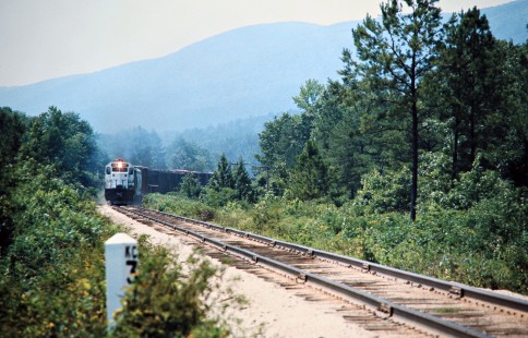 Southbound Kansas City Southern Railway freight train near Rich Mountain, Arkansas, on July 17, 1977. Photograph by John F. Bjorklund, © 2016, Center for Railroad Photography and Art. Bjorklund-61-08-16