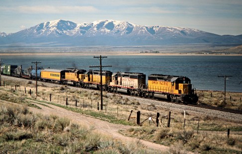 Eastbound Union Pacific Railroad freight train at Stockton, Utah, on April 8, 1989. Photograph by John F. Bjorklund, © 2016, Center for Railroad Photography and Art. Bjorklund-91-21-04