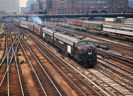 Amtrak passenger train no. 48, the <i>Broadway Limited</i>, operating on Penn Central track with E-units nos. 4294 and 4254  at Chicago, Illinois, on July 4, 1971. Photograph by John F. Bjorklund, © 2016, Center for Railroad Photography and Art. Bjorklund-79-08-08