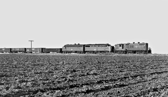 Southbound Missouri–Kansas–Texas Railroad rock train approaches Taylor, Texas, in March 1965. Photograph by J. Parker Lamb, © 2016, Center for Railroad Photography and Art. Lamb-02-040-10