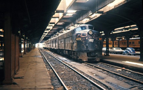 Ex-Pennsy E8 locomotive no. 4274 leading Amtrak passenger train no. 360, the <i>Wolverine</i>, at Michigan Central Station in Detroit, Michigan, on April 16, 1972. Photograph by John F. Bjorklund, © 2016, Center for Railroad Photography and Art. Bjorklund-79-13-10