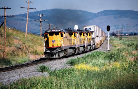 Eastbound Union Pacific Railroad freight train at Hot Lake, Oregon, on June 27, 1988. Photograph by John F. Bjorklund, © 2016, Center for Railroad Photography and Art. Bjorklund-91-10-08