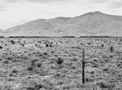 Southbound Southern Pacific Railroad manifest freight train passing peak near Oscura, New Mexico (south of Carrizozo), in April 1987. Photograph by J. Parker Lamb, © 2017, Center for Railroad Photography and Art. Lamb-02-093-02