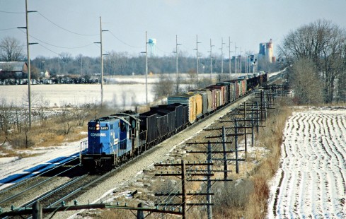 Westbound Conrail freight train near Delta, Ohio, on February 2, 1980. Photograph by John F. Bjorklund, © 2016, Center for Railroad Photography and Art. Bjorklund-81-22-21
