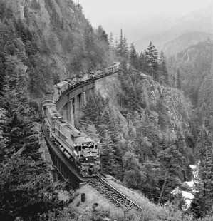 This view of Cheakamus Canyon (north of Pemberton, British Columbia) was a good hike off the highway, but well worth it. However, the light level was so low that the images are marginal. Here is a northbound British Columbia Railway freight train with two sets of power in June 1978. Photograph by J. Parker Lamb, © 2017, Center for Railroad Photography and Art. Lamb-02-110-06