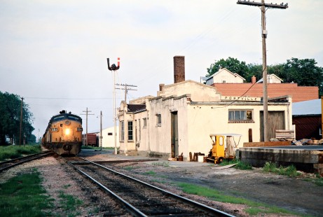 Westbound Milwaukee Road freight train at Postville, Iowa, on May 28, 1977. Photograph by John F. Bjorklund, © 2016, Center for Railroad Photography and Art. Bjorklund-65-16-06