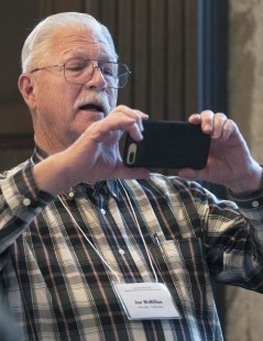 Joe McMillan snapping a photograph of the action on Friday night. Center for Railroad Photography and Art. Photograph by Henry A. Koshollek