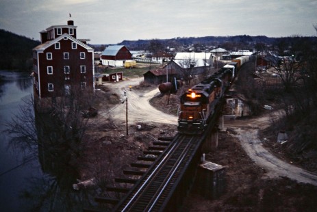 Southbound Milwaukee Road freight train in Bellevue, Iowa, on April 7, 1984. Photograph by John F. Bjorklund, © 2016, Center for Railroad Photography and Art. Bjorklund-69-13-14