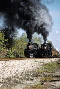 Westbound Ohio Central trains led by former Canadian Pacific Railway locomotive no. 1293 and Grand Trunk Western Railroad locomotive no. 6325 performing a photo runby at Coshocton, Ohio, on October 6, 2002. Photograph by John F. Bjorklund, © 2016, Center for Railroad Photography and Art. Bjorklund-78-06-20