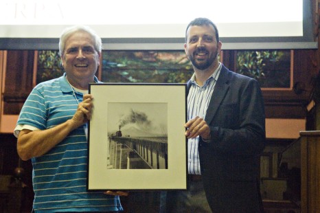 Gerard won a framed print donated by David Plowden in Saturday's raffle drawing. Center for Railroad Photography and Art. Photograph by Henry A. Koshollek