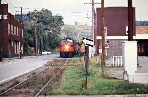 Milwaukee Road freight train passing through Iron Mountain, Michigan, on September 2, 1973. Photograph by John F. Bjorklund, © 2016, Center for Railroad Photography and Art. Bjorklund-64-08-12