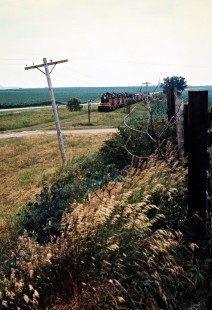 Eastbound Milwaukee Road freight train in Fountain, Minnesota, on July 19, 1976. Photograph by John F. Bjorklund, © 2016, Center for Railroad Photography and Art. Bjorklund-65-06-16
