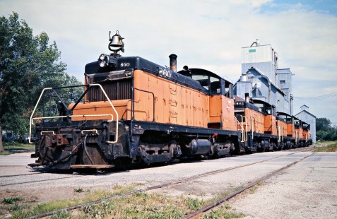 Eastbound Milwaukee Road freight train led by SW1 switchers at Harmony, Minnesota, on July 19, 1976. Photograph by John F. Bjorklund, © 2016, Center for Railroad Photography and Art. Bjorklund-64-29-03