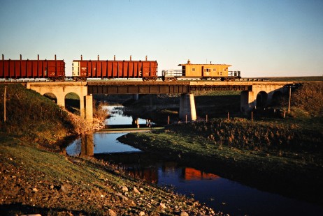 Eastbound Milwaukee Road freight train in Mina, South Dakota, on May 13, 1978. Photograph by John F. Bjorklund, © 2016, Center for Railroad Photography and Art. Bjorklund-66-09-06