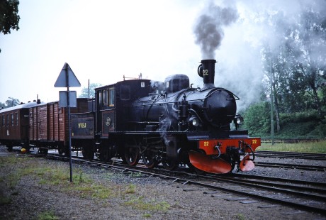Norsholm–Västervik–Hultsfreds Järnvägar steam locomotive no. 22 continues to travel in Åseda, Kronoberg, Sweden, on June 3, 1989. Photograph by Fred M. Springer, © 2014, Center for Railroad Photography and Art. Springer-Scan-Swiss-York-04-14