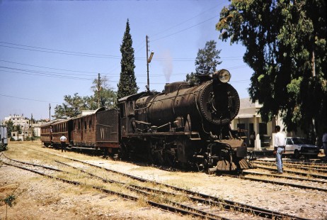 Hedjaz Jordan Railway 2-8-2 steam locomotive no. 71 in Amman, Jordan, on July 15, 1991. Photograph by Fred M. Springer, © 2014, Center for Railroad Photography and Art. Springer-Hedjaz-ZimZam(1)-02-08