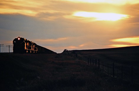 Eastbound Milwaukee Road coal train near Griffin, North Dakota, on July 18, 1980. Photograph by John F. Bjorklund, © 2016, Center for Railroad Photography and Art. Bjorklund-68-26-01