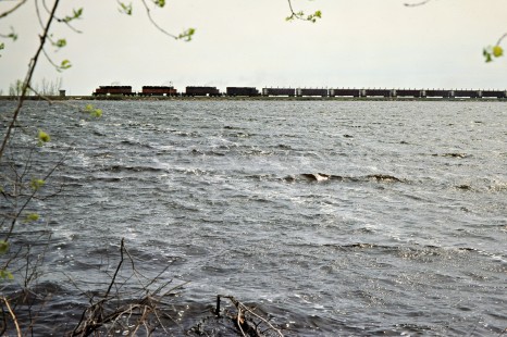 Eastbound Milwaukee Road freight train in McIntosh, South Dakota, on May 14, 1978. Photograph by John F. Bjorklund, © 2016, Center for Railroad Photography and Art. Bjorklund-66-11-05