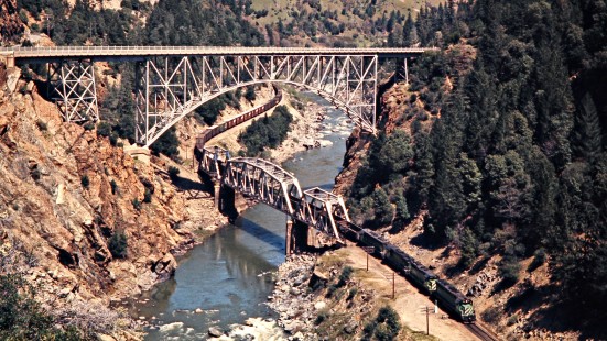 Westbound Burlington Northern freight train on the Western Pacific Railroad in Feather River Canyon at Pulga, California, on April 20, 1975. Photograph by John F. Bjorklund, © 2016, Center for Railroad Photography and Art. Bjorklund-93-05-04