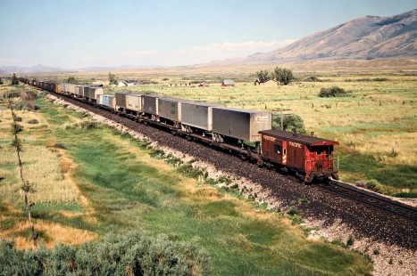 Eastbound Western Pacific Railroad freight train at Deeth, Nevada, on July 28, 1979. Photograph by John F. Bjorklund, © 2016, Center for Railroad Photography and Art. Bjorklund-93-08-21